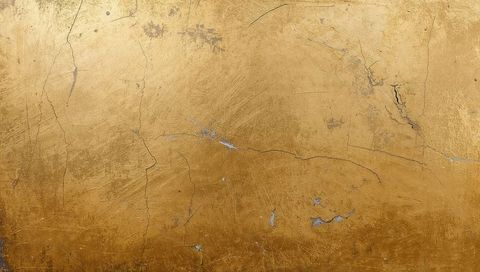 Gilded gold leaf panel showing patina, hairline cracks, scratches and antique texture