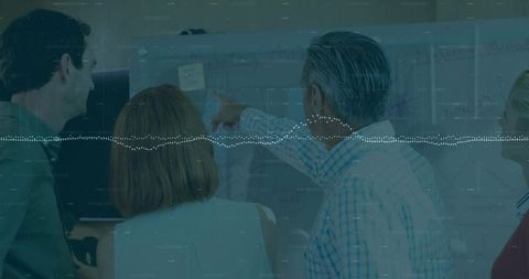 Senior Leader Guiding Team with Data-driven Strategy