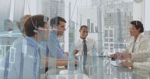 Business Professionals Analyzing Financial Data in Modern Office Meeting