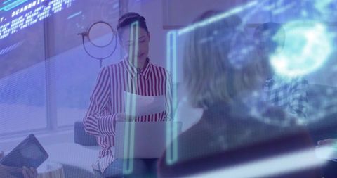 Businesswoman Analyzing Data Streams with Technology Overlay in Modern Office