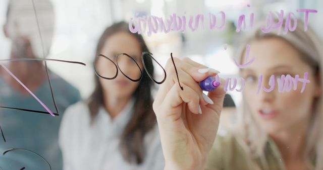 Business Team Brainstorming Ideas on Glass Whiteboard - Download Free Stock Images Pikwizard.com