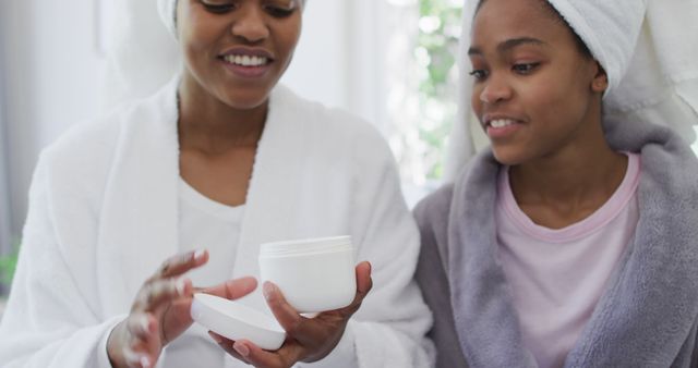 Mother and Daughter Relaxing with Skincare Treatments - Download Free Stock Images Pikwizard.com