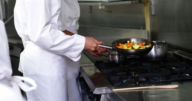 Professional Chef Cooking Vegetables in Restaurant Kitchen - Download Free Stock Images Pikwizard.com