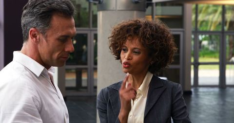 Multiracial Professionals in Serious Business Conversation