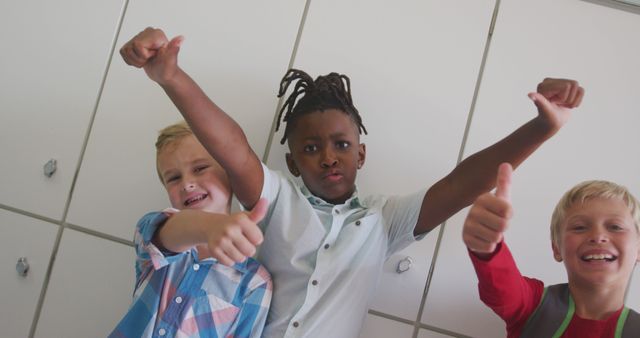 Diverse group of happy children giving thumbs up - Download Free Stock Images Pikwizard.com