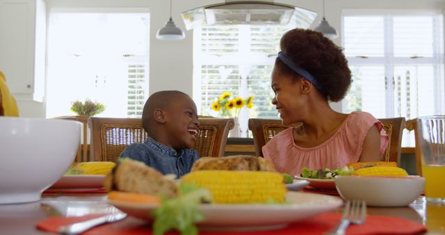 Mother and Son Enjoying Meal at Home - Download Free Stock Images Pikwizard.com