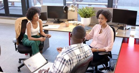 Young Mixed Ethnicity Professionals Collaborating in Modern Office - Download Free Stock Images Pikwizard.com