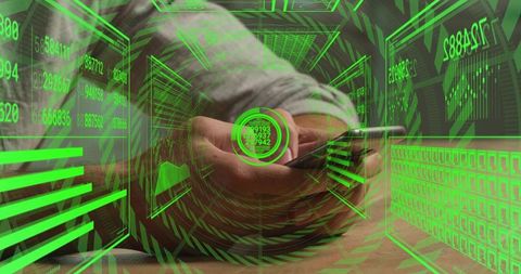Man Holding Smartphone with Neon Green Augmented Reality HUD Over Wooden Desk