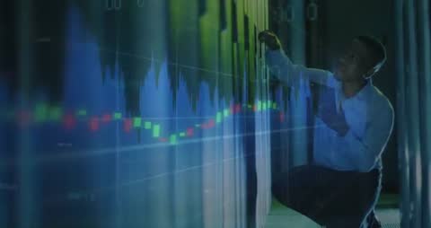 IT Technician with Floating Finance Charts Analyzing Data Center Connectivity