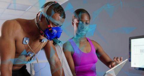 Athlete undergoing cardiopulmonary exercise testing with metabolic mask and ecg electrodes