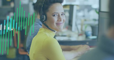 Businesswoman using headset in office with digital data overlay