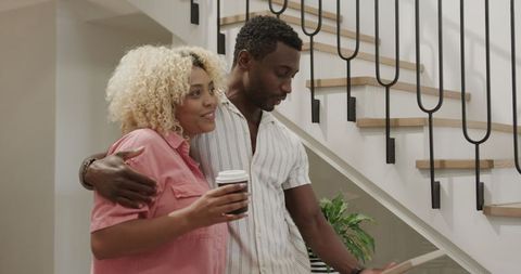 Friends Discussing Home Decor Ideas in Modern Interior