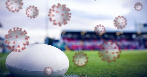 Rugby Ball and Floating Viruses Illustrating Pandemic Impact on Sports - Download Free Stock Images Pikwizard.com