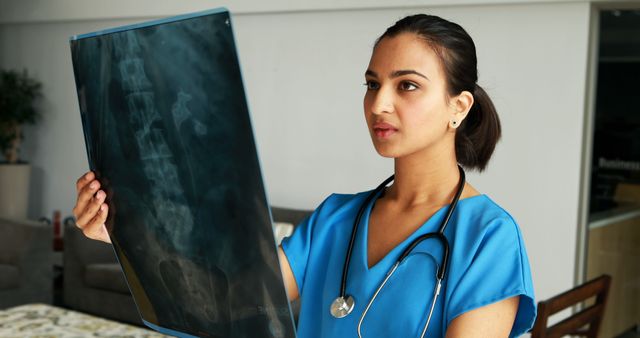 Female Doctor Analyzing X-ray in Clinic - Download Free Stock Images Pikwizard.com