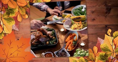 Carving roast poultry at autumn harvest dinner with sides, candles and family gathering