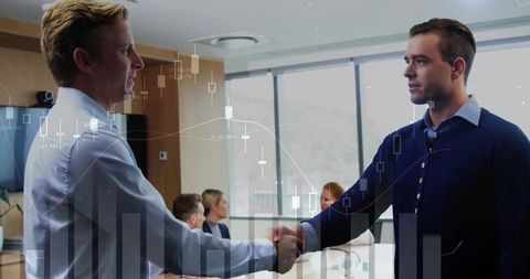 Businessmen shaking hands with financial chart overlay in office