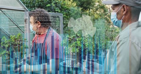 Diverse Workers Analyzing Data in Modern Agricultural Setting