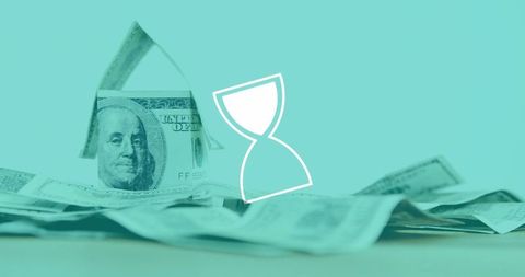 Time and Money Concept: Hourglass Over Dollar Bills - Download Free Stock Images Pikwizard.com