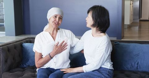 Diverse Older Women Conversing and Supporting One Another