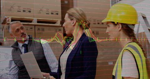 Warehouse Team Analyzing Financial Trends with Digital Overlay - Download Free Stock Images Pikwizard.com