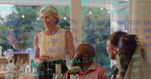 Woman Giving Toast at Elegant Reception with Financial Ticker Overlay and Guests Listening