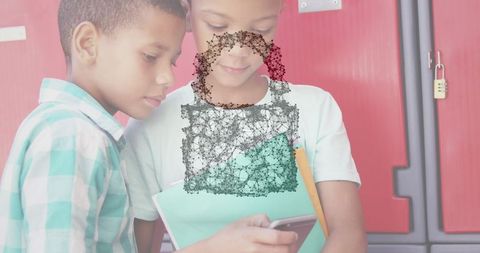 Two Students Collaborating with Smartphone Near School Lockers