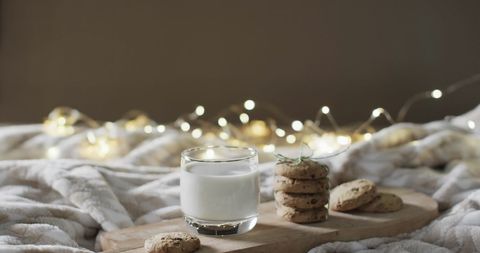 Glass of Milk and Chocolate Chip Cookies in Cozy Bed Setting - Download Free Stock Images Pikwizard.com