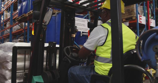 Worker Operating Forklift in Warehouse with Safety Gear - Download Free Stock Images Pikwizard.com