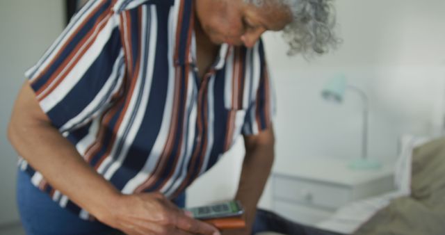 Senior Woman Checking Blood Glucose Levels at Home - Download Free Stock Images Pikwizard.com