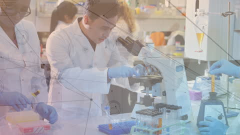 Diverse Lab Workers Engaged in Scientific Research & Data Connections