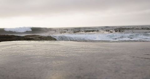Crashing Ocean Waves Against Rugged Shoreline at Dusk - Download Free Stock Images Pikwizard.com