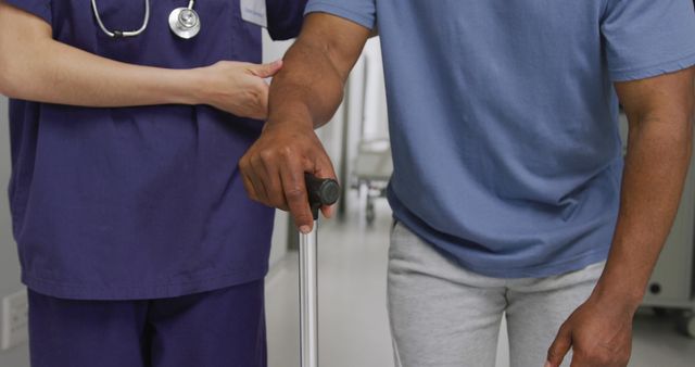 Nurse Assisting Male Patient Walking With Cane - Download Free Stock Images Pikwizard.com