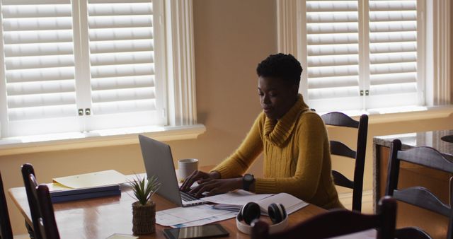 Woman Working from Home at Dining Table with Laptop - Download Free Stock Images Pikwizard.com