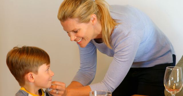 Mother Helping Son Get Ready, Positive Parenting - Download Free Stock Images Pikwizard.com