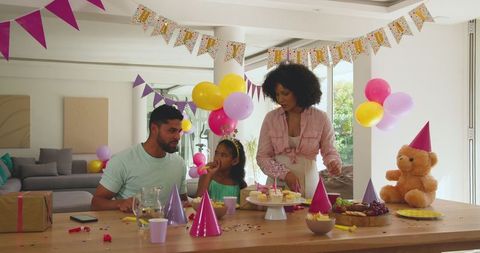 Diverse Family Celebrating Birthday Together at Home