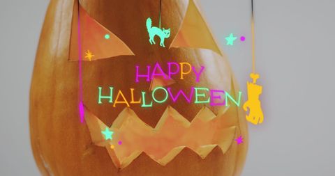 Neon Happy Halloween Text Over Carved Pumpkin - Download Free Stock Images Pikwizard.com