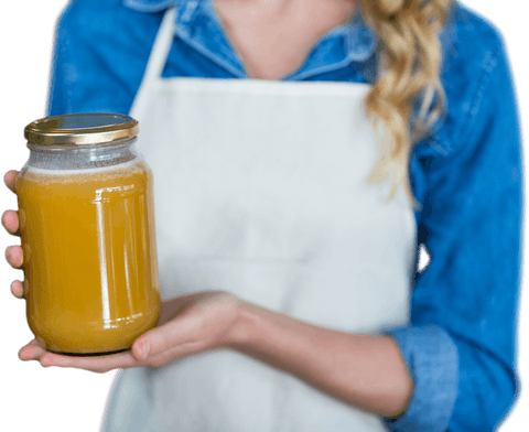 close-up of woman holding glass jar honey transparent background - Download Free Stock Videos Pikwizard.com