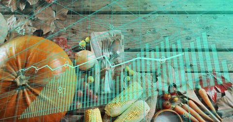 Autumn harvest table with pumpkin, corn, carrots and teal data graph overlay for market analytics