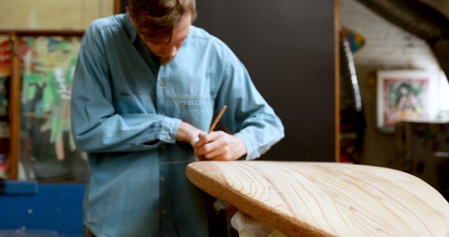 Skilled Craftsman Creating Surfboard in Workshop - Download Free Stock Images Pikwizard.com