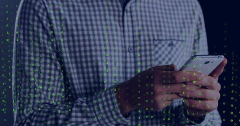 Tech Professional Using Smartphone Obscured by Binary Code
