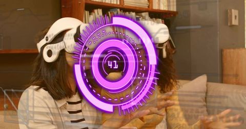 Two women wearing VR headsets gesturing on couch with purple HUD overlay for collaboration
