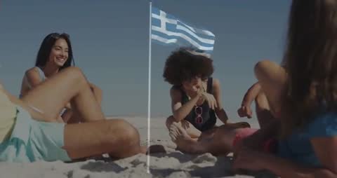 Friends Enjoying Summer Beach Day with Greek Flag