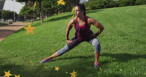 Woman Exercising with Side Lunge on Grassy Lawn Outdoors