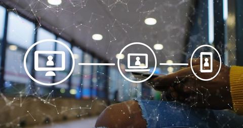 Traveler holding smartphone in airport lounge tapping screen with network icons