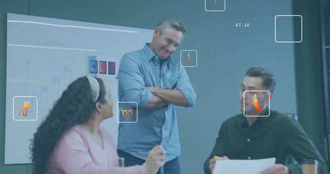 Diverse Team Analyzing Ecology Icon Data in Modern Office Setting