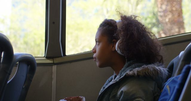 Young Girl in Headphones Relaxing on a Bus - Download Free Stock Images Pikwizard.com