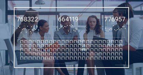 Business team reviewing data on tablet with digital analytics overlay in modern office