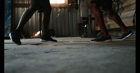 Boxer Training Footwork Skills with Coach in Industrial Style Gym - Download Free Stock Images Pikwizard.com