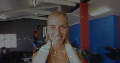 Happy Woman in Gym with Towel, Fitness Enthusiasm