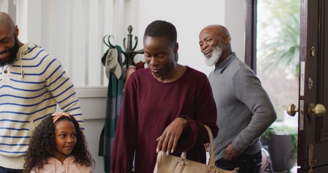 Family Entering Home Wearing Casual Clothing and Smiling - Download Free Stock Images Pikwizard.com